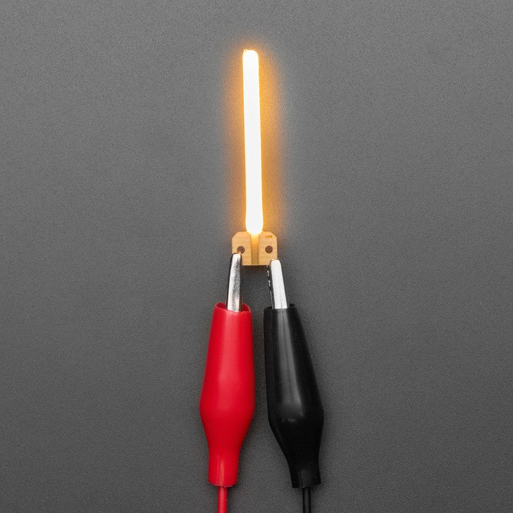 Alphabet LED Filament - This warm-white glowy letter is made out of COB (chip on board) LEDs, often seen in 'Edison-like' LED bulbs, arranged in different patterns to give a bright, warm lighting effect.