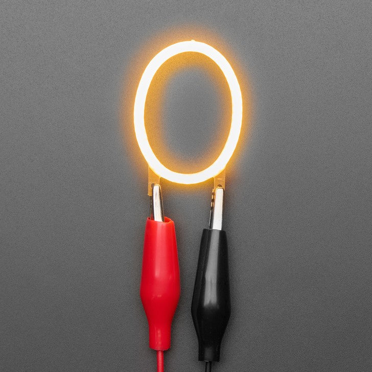 Alphabet LED Filament - This warm-white glowy letter is made out of COB (chip on board) LEDs, often seen in 'Edison-like' LED bulbs, arranged in different patterns to give a bright, warm lighting effect.