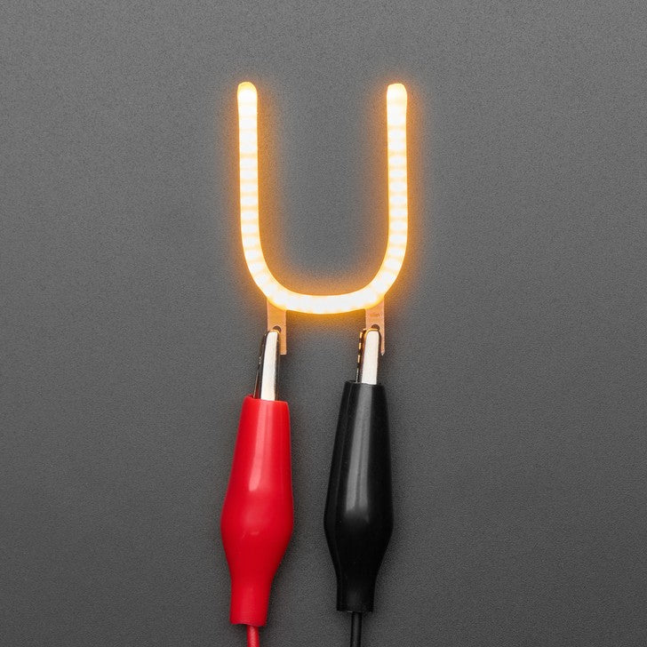 Alphabet LED Filament - This warm-white glowy letter is made out of COB (chip on board) LEDs, often seen in 'Edison-like' LED bulbs, arranged in different patterns to give a bright, warm lighting effect.