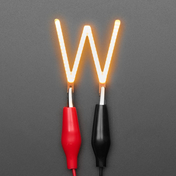 Alphabet LED Filament - This warm-white glowy letter is made out of COB (chip on board) LEDs, often seen in 'Edison-like' LED bulbs, arranged in different patterns to give a bright, warm lighting effect.