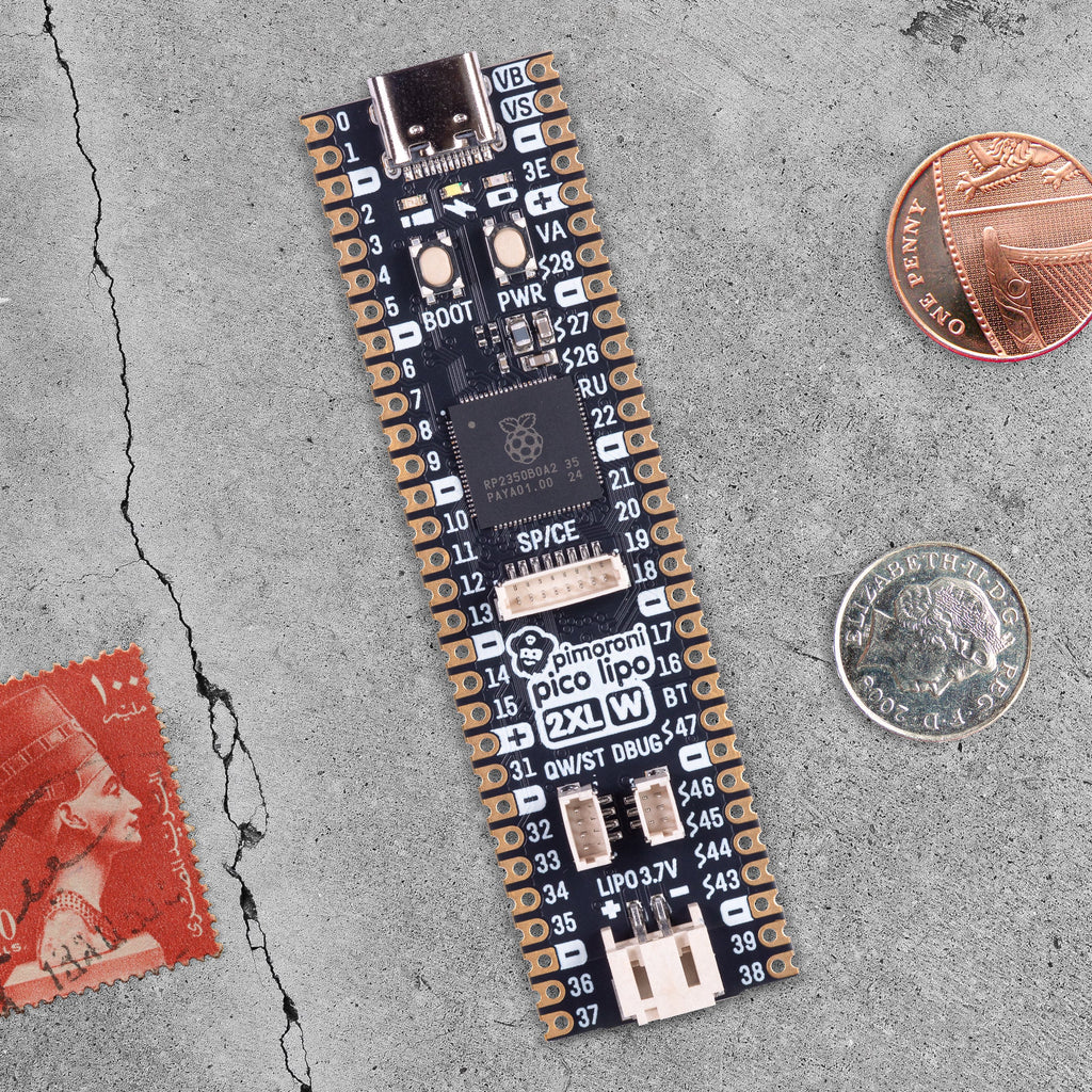 Pimoroni Pico LiPo 2 XL W - An elongated Pirate-brand RP2350-powered board with 16MB of flash, 8MB of PSRAM, USB-C, Qw/ST, 2.4GHz wireless / Bluetooth and built-in LiPo charging.