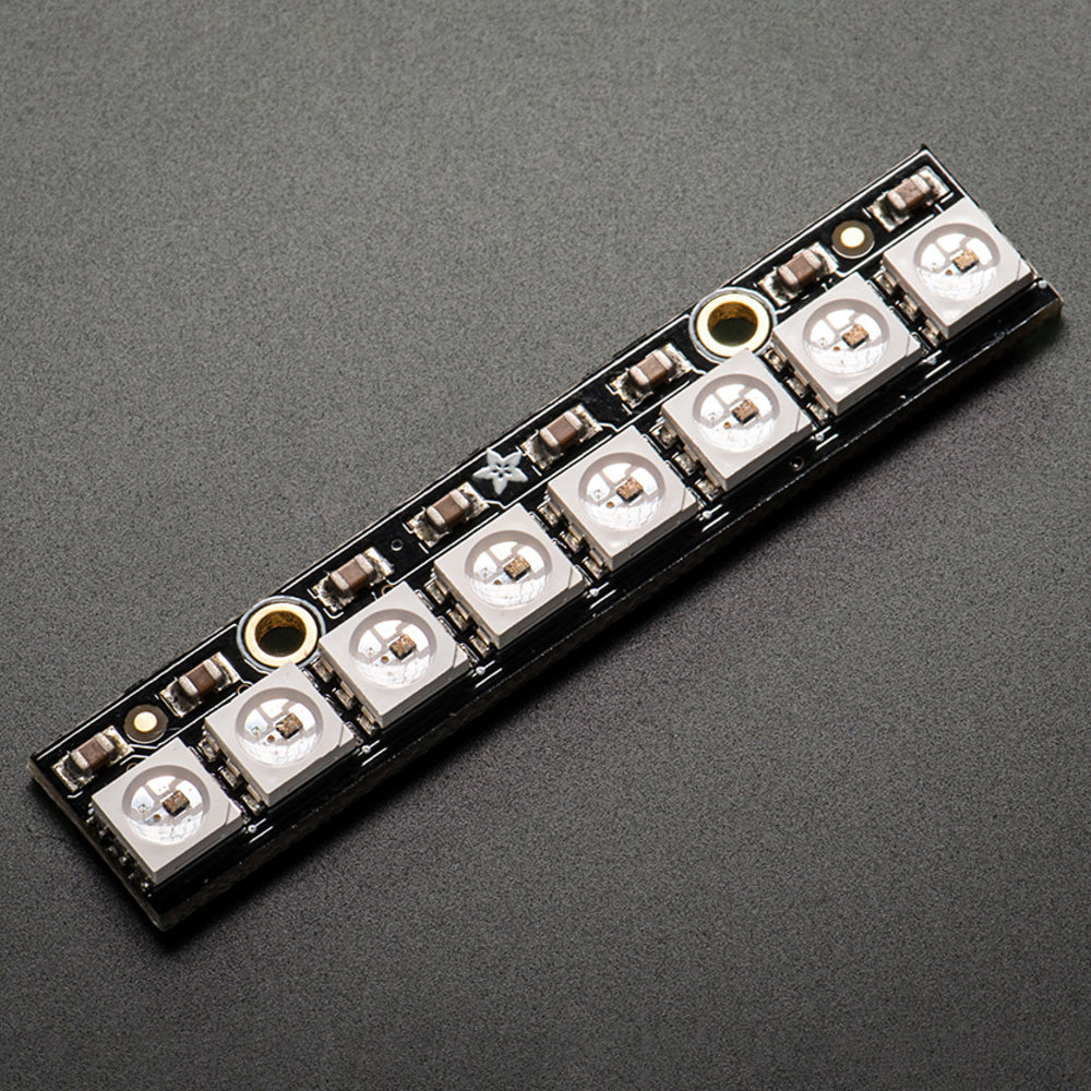 NeoPixel Stick - 8 x 5050 RGB LED with Integrated Drivers - Make your own little LED strip arrangement with this stick of NeoPixel LEDs. Adafruit crammed 8 of the tiny 5050 (5mm x 5mm) smart RGB LEDs onto a PCB with mounting holes and a chainable design. Use only one microcontroller pin to control as many as you can chain together!