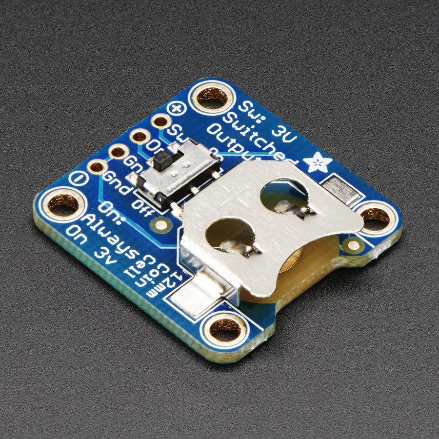 12mm Coin Cell Breakout w/ On-Off Switch - Simple but effective - this breakout board has a CR1220 coin cell battery holder soldered on, an on/off switch and 0.1" pitch breakout pins for easy connecting. Great for powering very low-current projects, or adding a battery backup circuit to a real-time-clock or similar. There's two ground pins, one 'switched' power pin, and one pin that is always on.