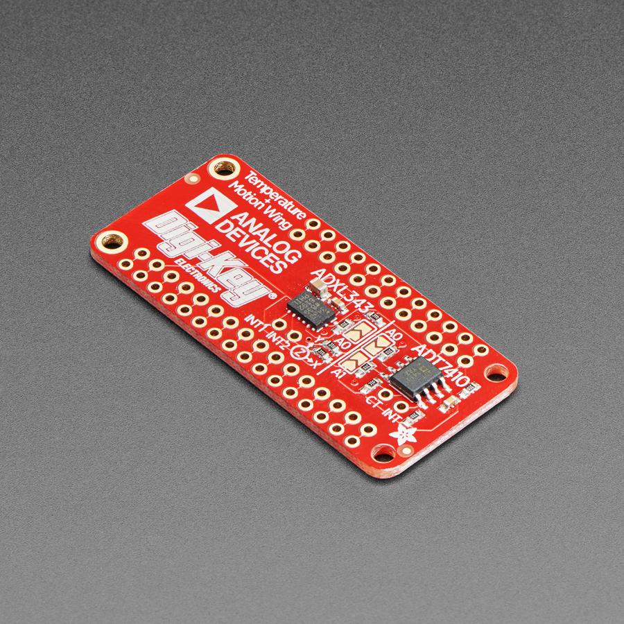 Adafruit ADXL343 + ADT7410 Sensor FeatherWing - Upgrade any Feather board with motion and precision temperature sensing, with this all-in-one sensing FeatherWing. It sports two fantastic sensors from Analog Devices: an ADXL343 triple-axis accelerometer and an ADT7410 precision temperature sensor.