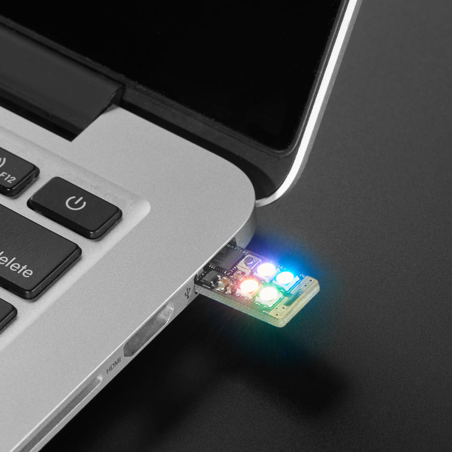 Adafruit Neo Trinkey - SAMD21 USB Key with 4 NeoPixels - It's half USB Key, half Adafruit Trinket...it's Neo Trinkey, the circuit board with a Trinket M0 heart and four RGB NeoPixels for customizable glow.
