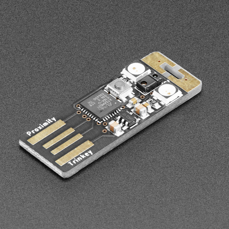 Adafruit Proximity Trinkey - USB APDS9960 Sensor Dev Board - It's half USB Key, half Adafruit Trinket M0, half APDS9960 breakout...it's Proximity Trinkey, the circuit board with a Trinket M0 heart, APDS9960 Proximity, Light, RGB, and Gesture Sensor, and two RGB NeoPixels for a customizable glow.