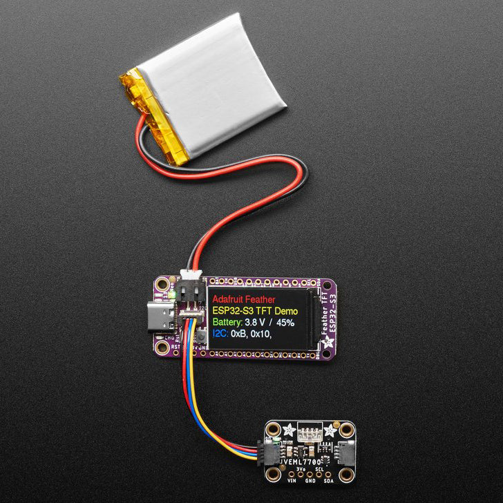Adafruit ESP32-S3 TFT Feather - 4MB Flash, 2MB PSRAM, STEMMA QT - An ESP32-S3 Feather board with a built in IPS TFT color display. It's got all the features of a Feather main board, the comforting warmth of an ESP32-S3 WiFi+BLE microcontroller, and the crispness of a 240x135 pixel color TFT display.