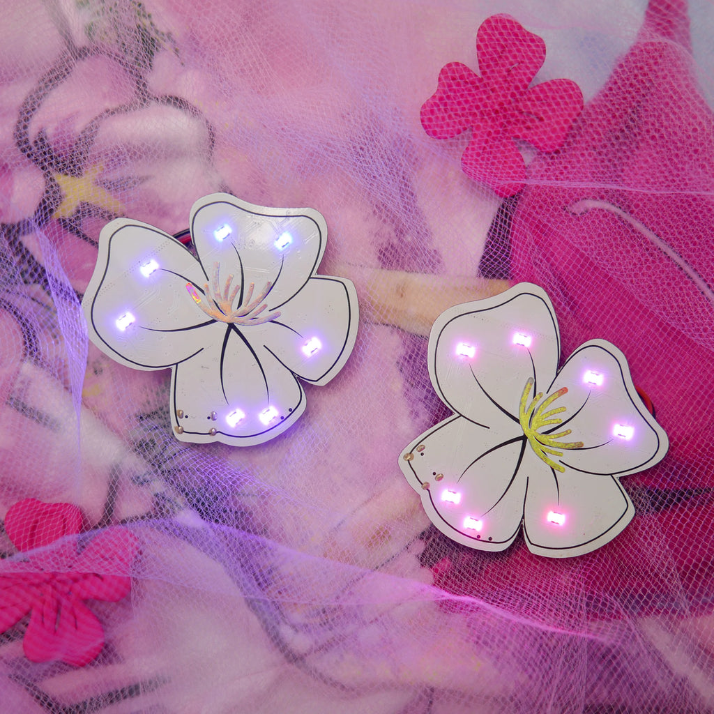 Kitty’s Flower - Bluetooth Wearable Brooches - Kitty's Flower is a pair of Bluetooth wearable brooches designed by the multitalented physicist, artist and creative technologist Dr Kitty Yeung.