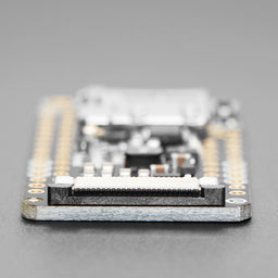 An image of Adafruit eInk Feather Friend with 32KB SRAM