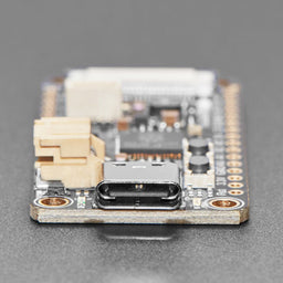 An image of Adafruit RP2040 Feather ThinkInk for 24-pin E-Paper Displays - STEMMA QT