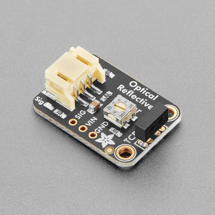 Adafruit STEMMA Reflective Photo Interrupt Sensor - TCRT1000 - An optical reflective sensor is a composite electronic device with two elements - an IR LED and an IR photo-transistor. The IR LED blasts light, and when something bounces the light back to the photo-transistor, the transistor turns on and the amount of current flowing through it increases.