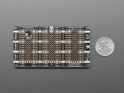 An image of Adafruit Proto Tripler PiCowbell for Pico and PicoW