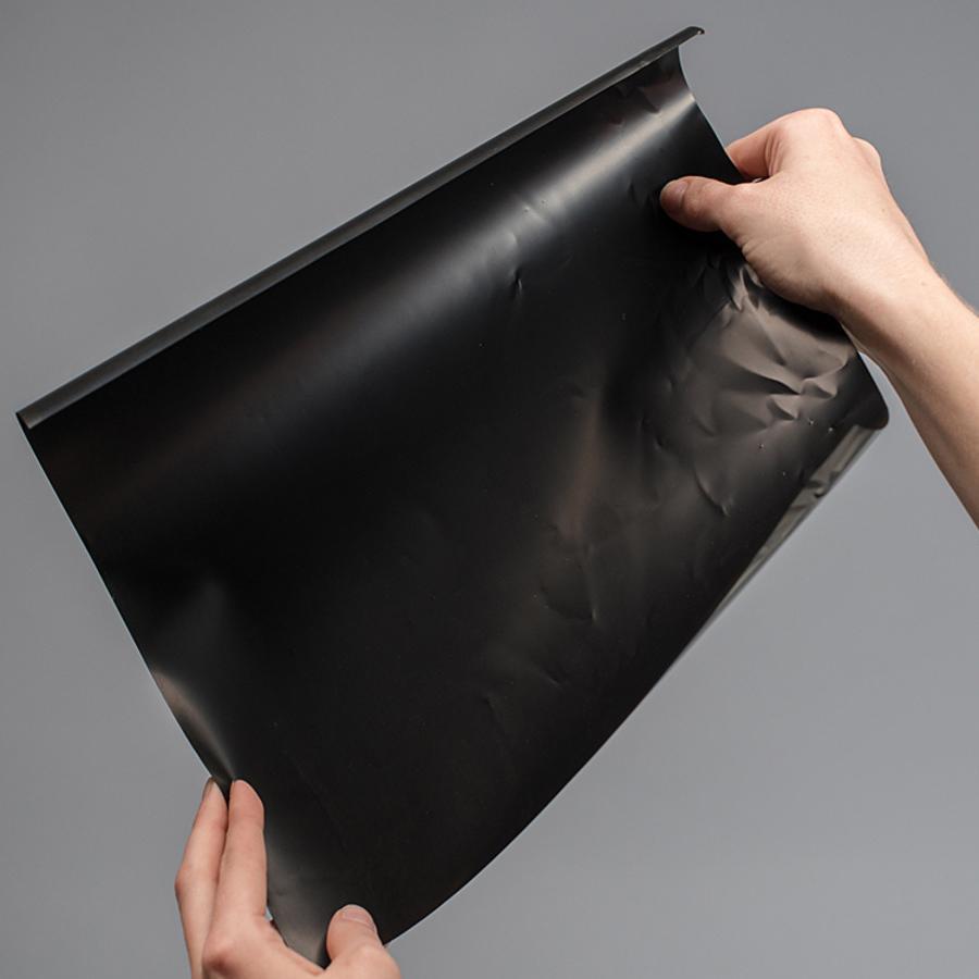 Pressure-Sensitive Conductive Sheet (Velostat/Linqstat) - This conductive material (also known as "Velostat" or "Linqstat") is a nice addition for your wearable/sensor hacking toolkit. It's pressure-sensitive: squeezing it will reduce the resistance, so it's handy for making flexible sensors.