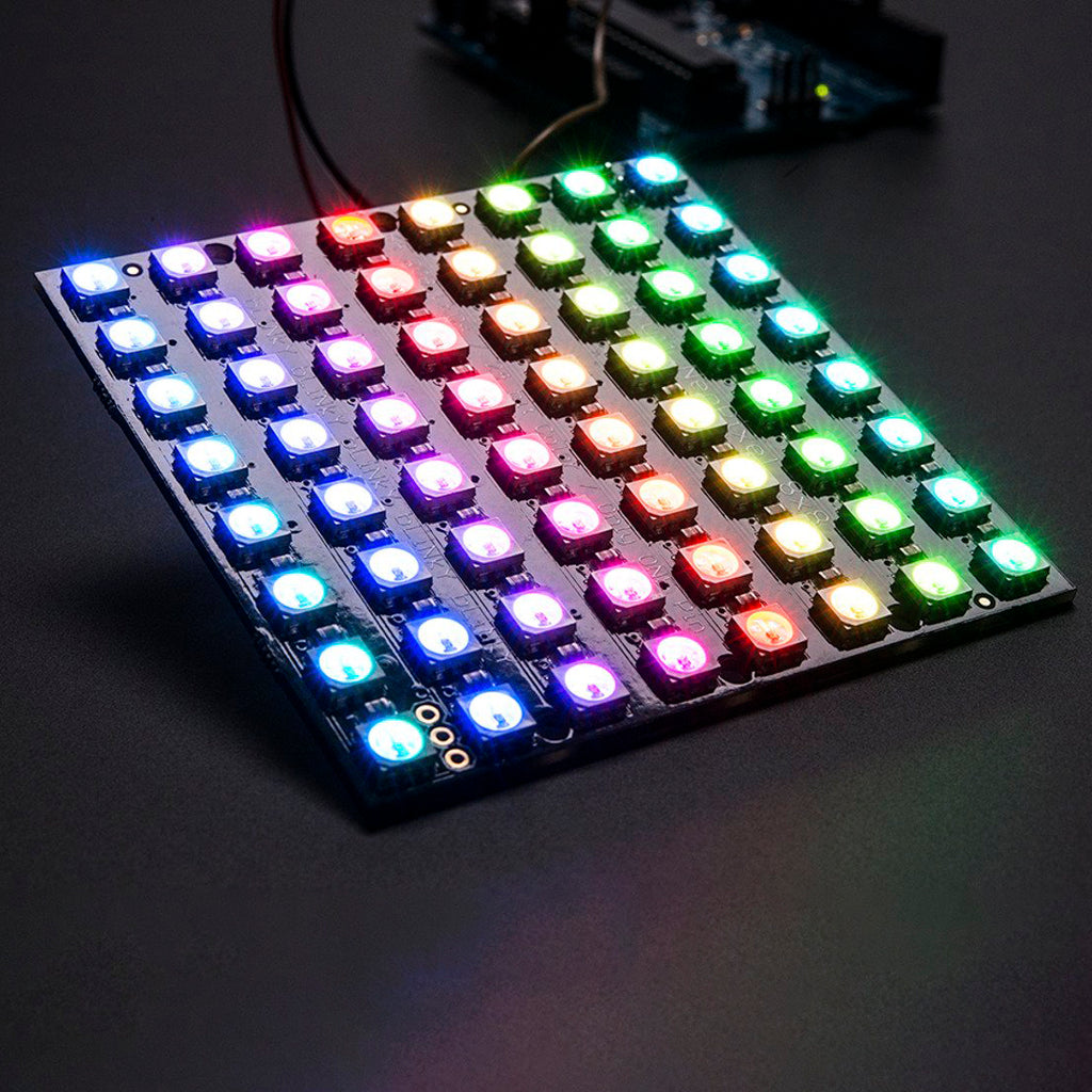 Adafruit NeoPixel NeoMatrix 8x8 - 64 RGB LED Pixel Matrix - Put on your sunglasses before wiring up this LED matrix - 64 eye-blistering RGB LEDs adorn the NeoMatrix for a blast of configurable color.