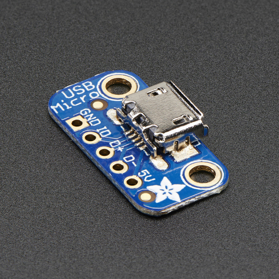 Adafruit USB Micro-B Breakout Board - Simple but effective - this breakout board has a USB Micro-B connector, with all 5 pins broken out. Great for pairing with a microcontroller with USB support, or adding USB 5V power to a project. 