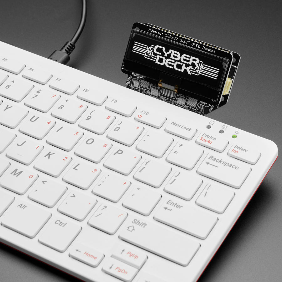 Adafruit CYBERDECK Bonnet for Raspberry Pi 400 - Howdy keyboard cowboys, are you surfing the information superhighway with a Pi 400? Want a cool heads-up display, or maybe you need to wire up some NeoPixel wetware...?