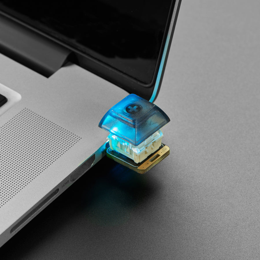 Adafruit NeoKey Trinkey - USB NeoPixel Mechanical Key Switch - It's half USB Key, half Adafruit Trinket, half mechanical keeb...it's NeoKey Trinkey, the circuit board with a Trinket M0 heart, a NeoPixel glow, and a Cherry MX-compatible.