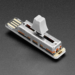 An image of Adafruit Slider Trinkey - USB NeoPixel Slide Potentiometer