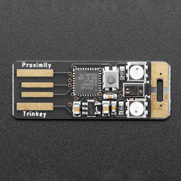 An image of Adafruit Proximity Trinkey - USB APDS9960 Sensor Dev Board