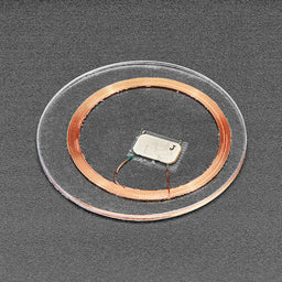 An image of 13.56MHz RFID/NFC Clear Tag - NTAG203 Chip