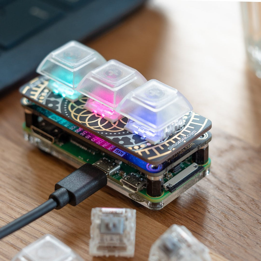 Keybow Kit (3-key) - Keybow MINI is a 3-key version of our wildly-popular Keybow mini mechanical keyboard. Like its older sibling, Keybow MINI has RGB-illuminated, hot-swap, mechanical switches, and clear key caps. It's the perfect way to add a tiny macro pad to your desk, or to use as a little osu! controller.